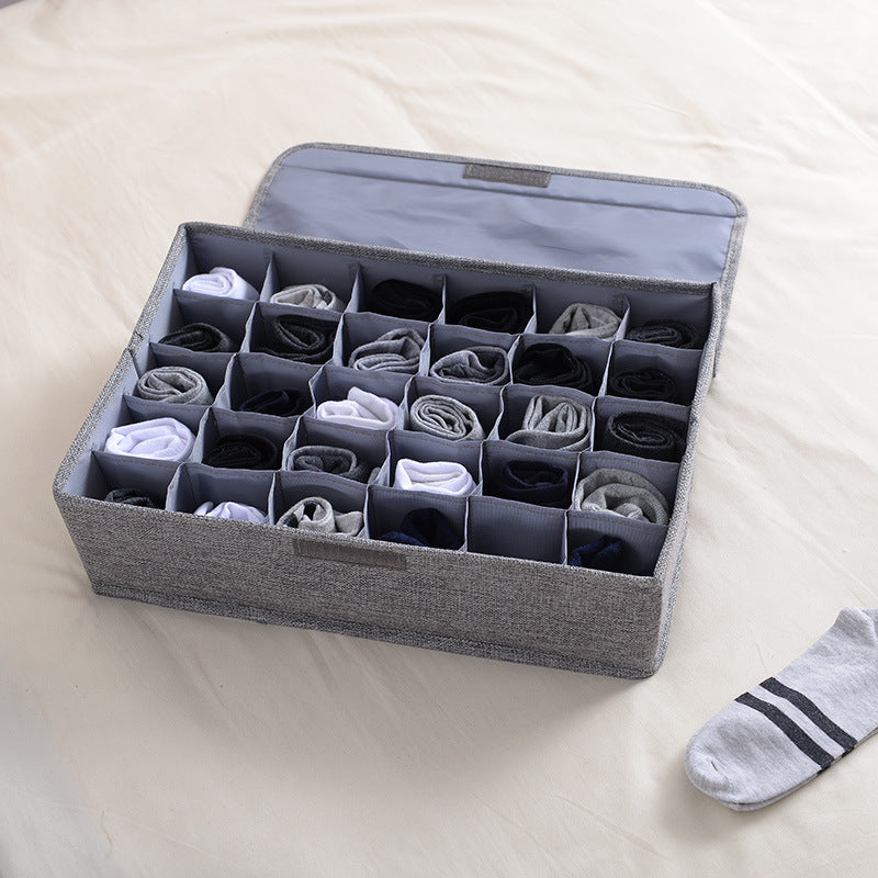 Collapsible fabric storage box for home use—dust-proof, multi-compartment organizer for underwear, socks, and lingerie.