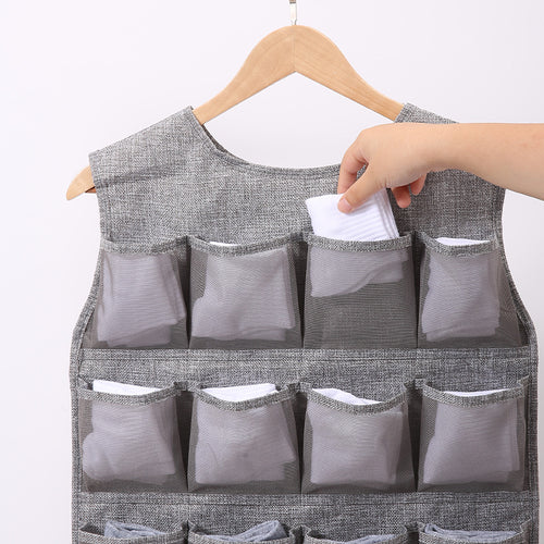 Double-sided hanging storage organizer for underwear and socks—made of Oxford cloth, designed for wall-mounted use.